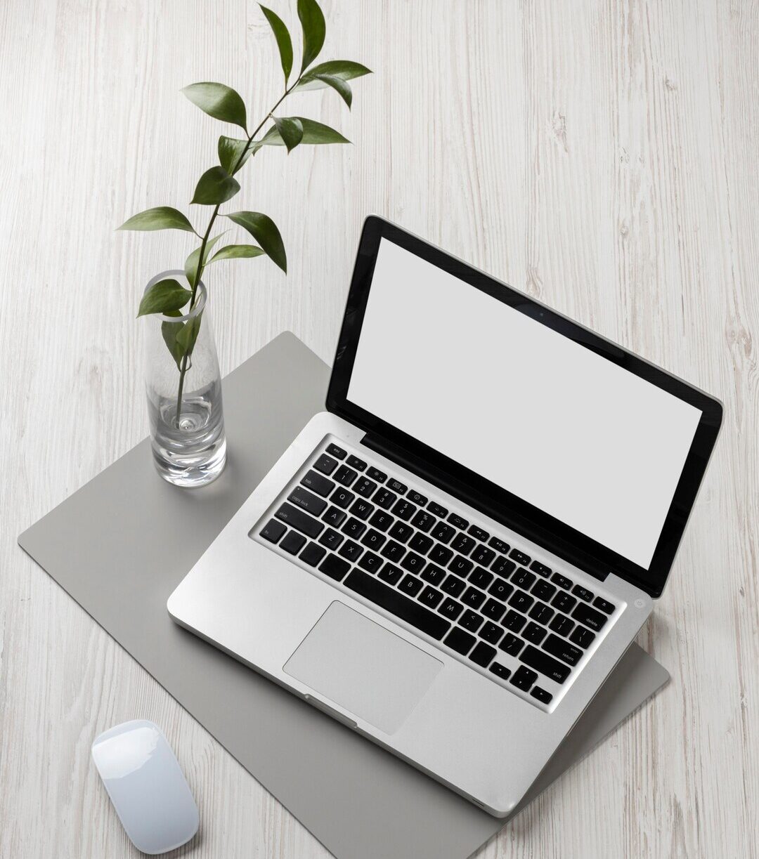 high angle desk arrangement with laptop 23 2149073070 e1773733901154